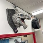 Reality A Games- white dragon on the wall!